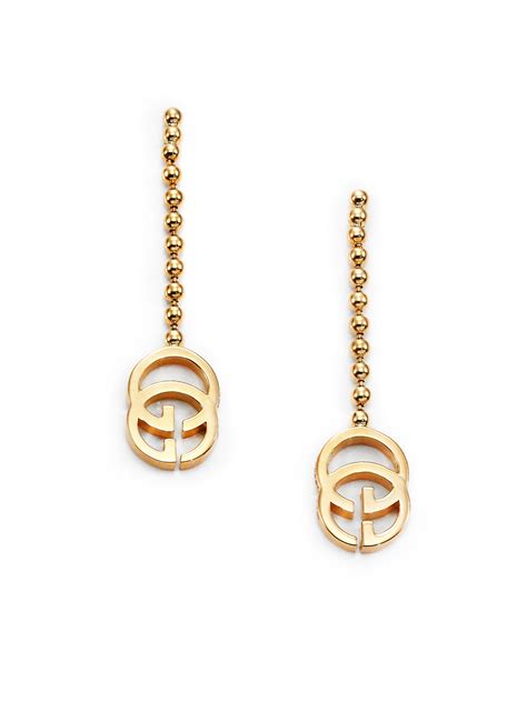 gucci gold drop earrings.